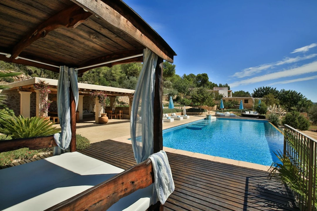 1681312783-Luxury real estate Ibiza to rent villa can Tifany spain property chill out pool outside.webp